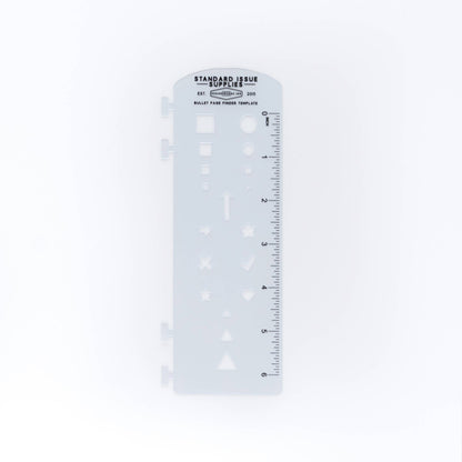 Clear plastic ruler with measurement markings on a white background