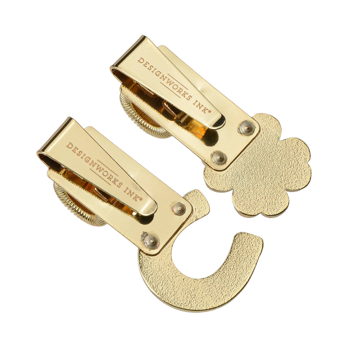 Two gold metal clips with 'Designworks Ink' branding on a white background