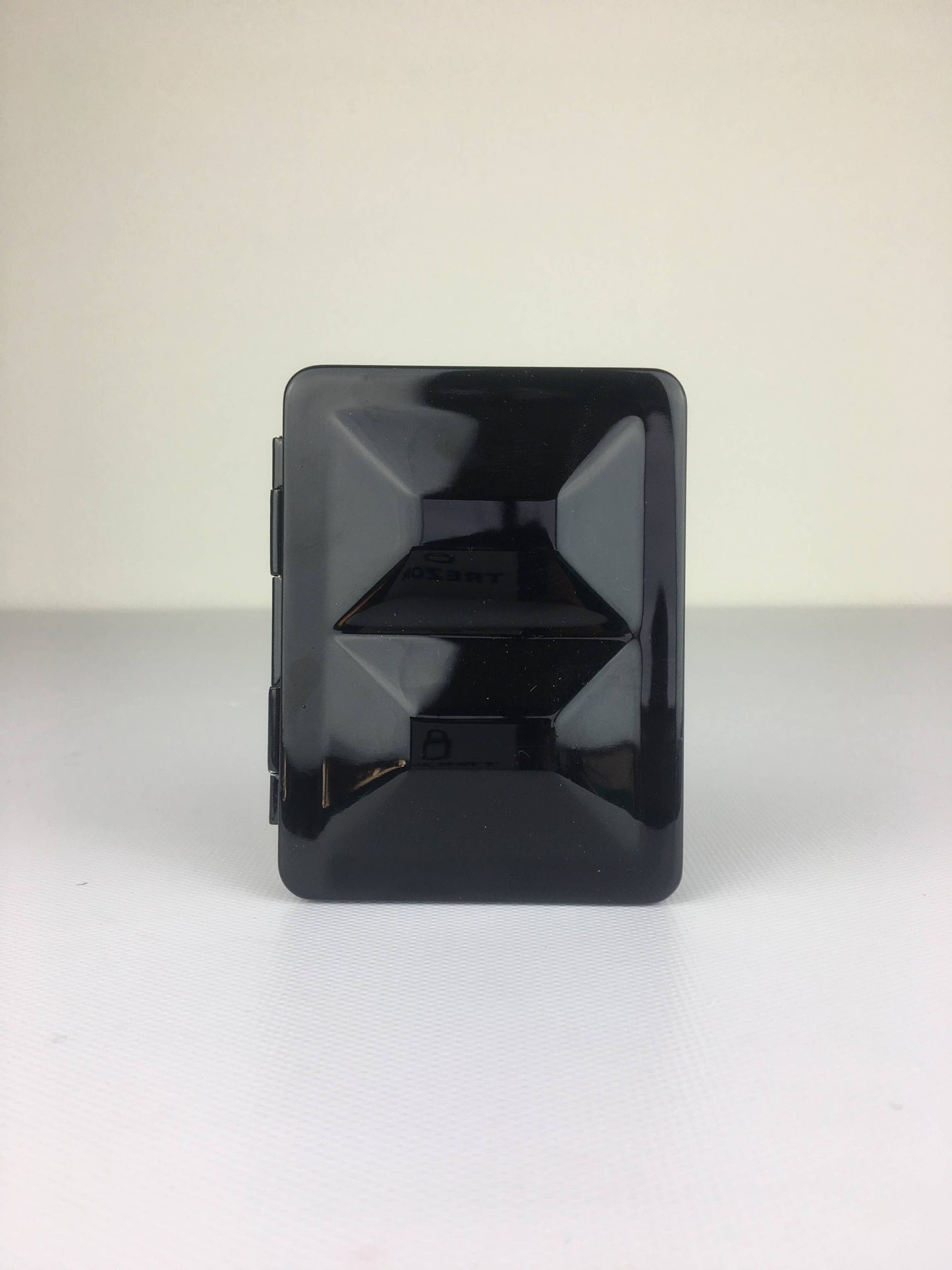 Black rectangular object on a white background