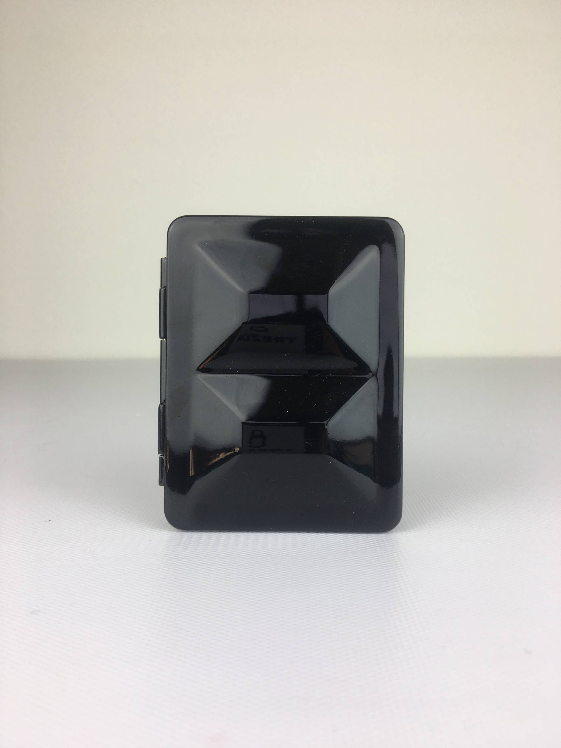 Black rectangular object on a white background