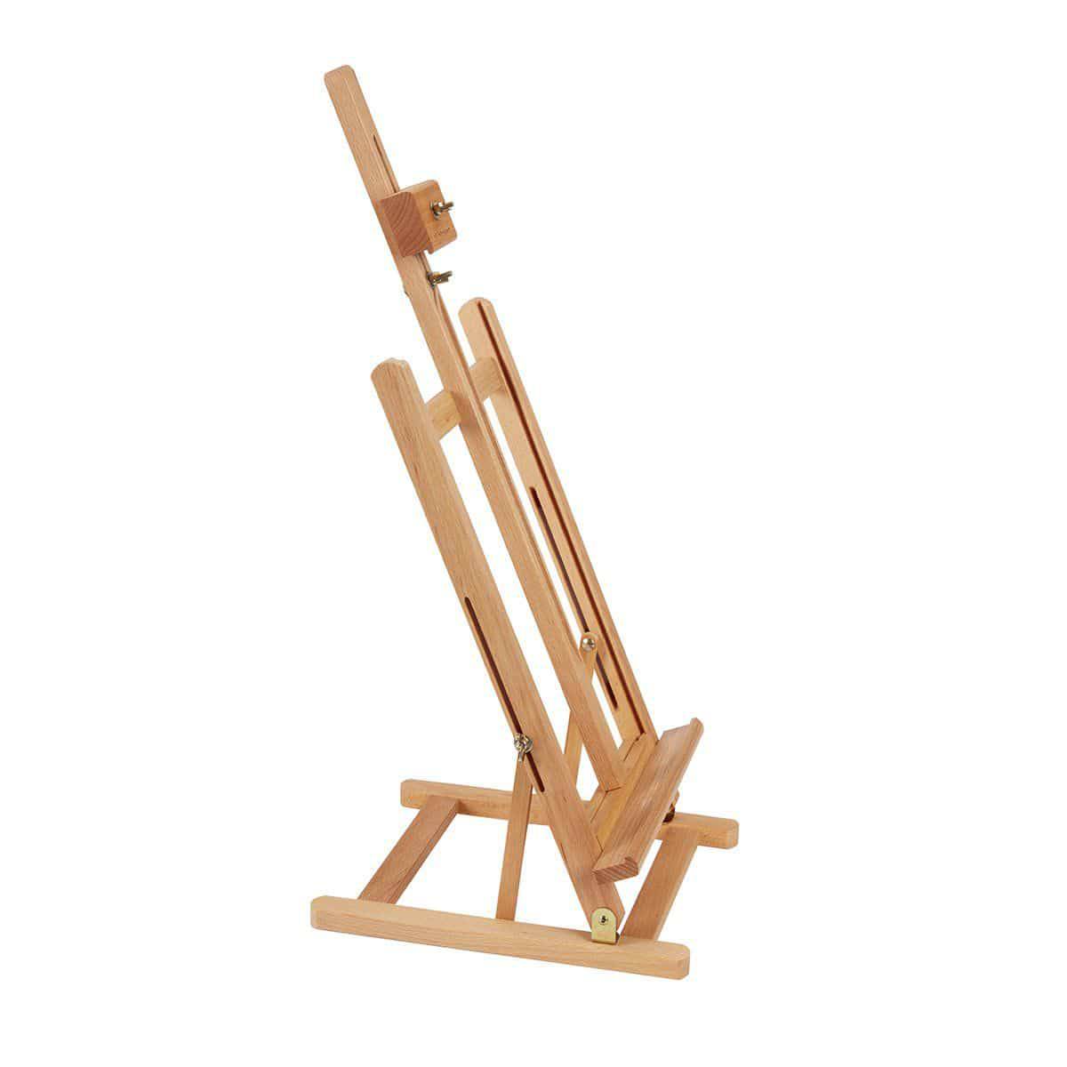 Wooden artist's easel on a white background