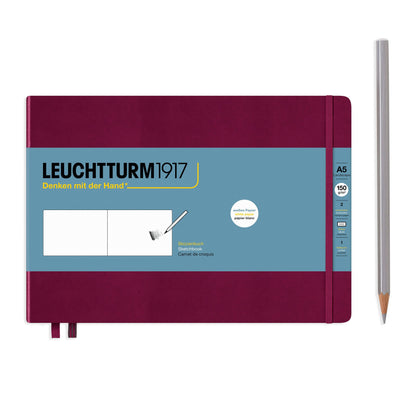 Leuchtturm1917 notebook with a pen on a white background