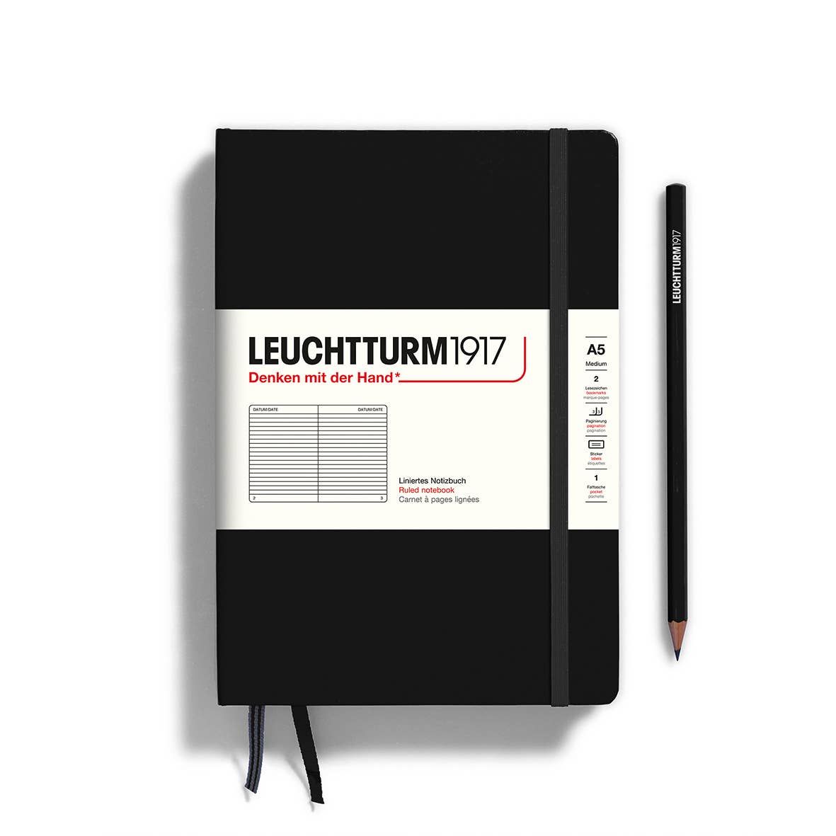 Black notebook with white label featuring 'Leuchtturm1917' on a white background