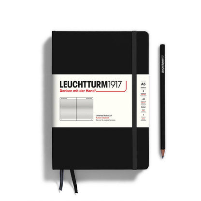 Black notebook with white label featuring 'Leuchtturm1917' on a white background